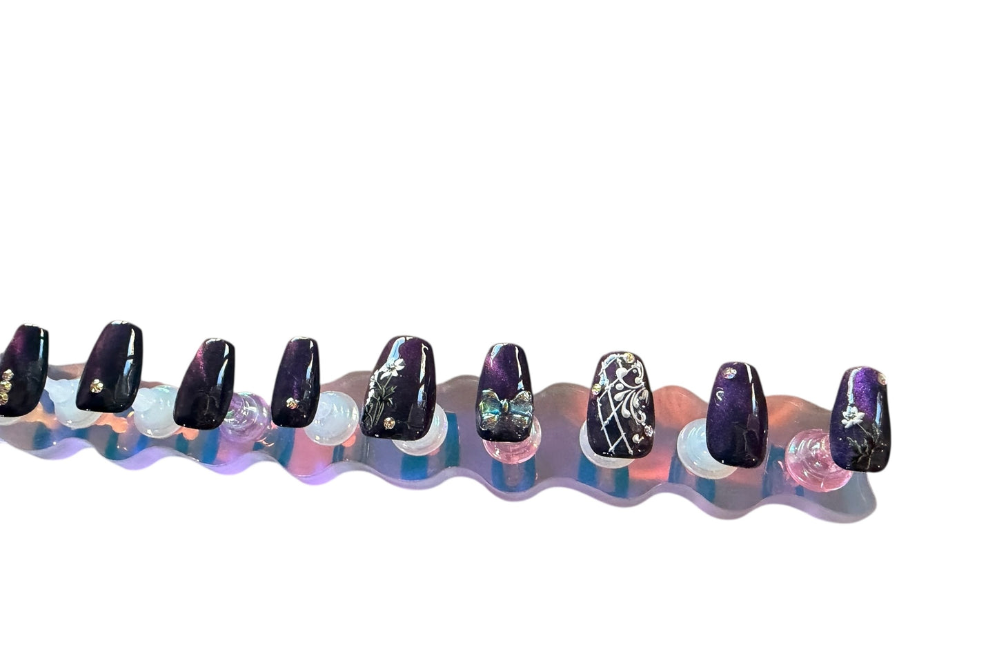 Polished press ons Luxury press-on nails with glossy finish, precision shape, and high-end salon-quality design