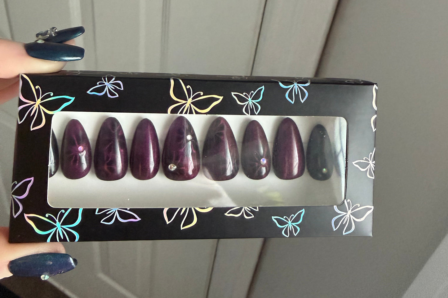 black and pink magnetic cat eye polish gel nails