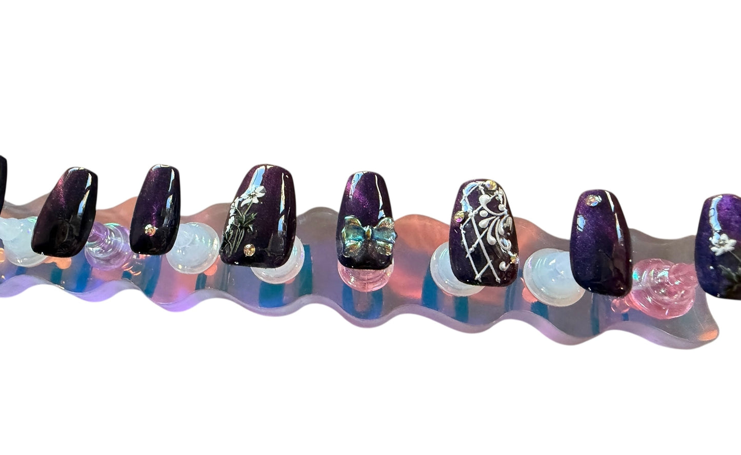 Polished press ons Luxury press-on nails with glossy finish, precision shape, and high-end salon-quality design