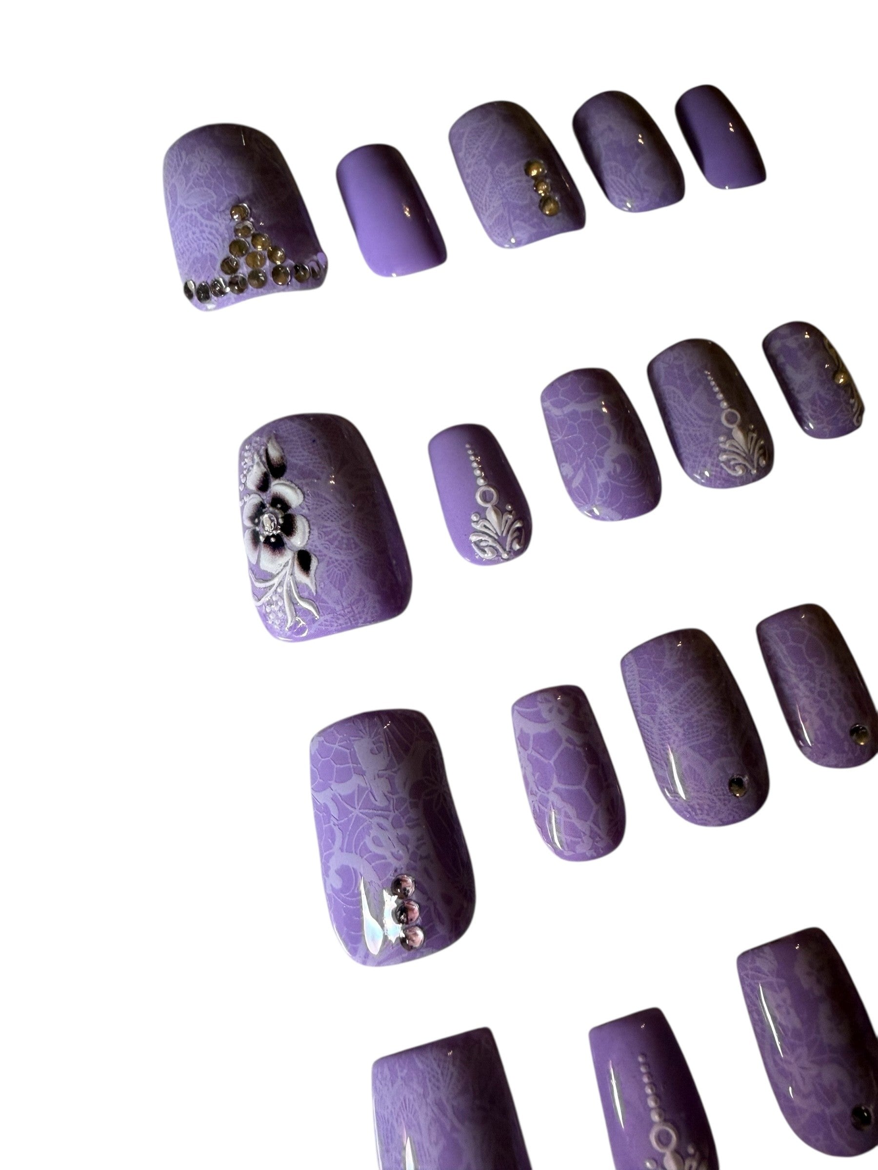 Polished press ons Luxury press-on nails with glossy finish, precision shape, and high-end salon-quality design
