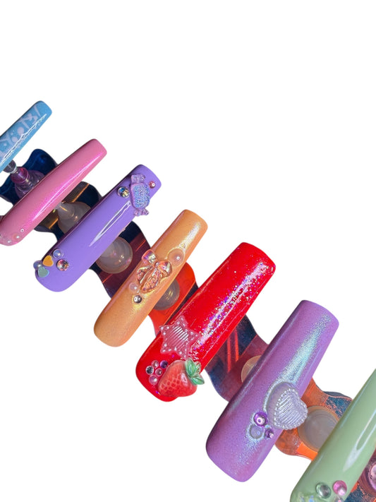 Polished press ons Luxury press-on nails with glossy finish, precision shape, and high-end salon-quality design